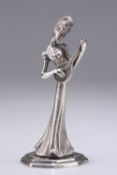 A CONTINENTAL SILVER FIGURE OF A MUSICIAN