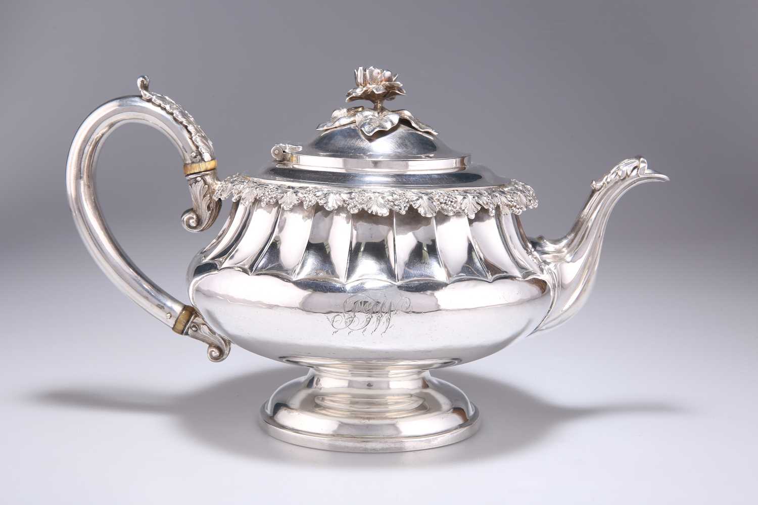 A GEORGE IV SILVER TEAPOT