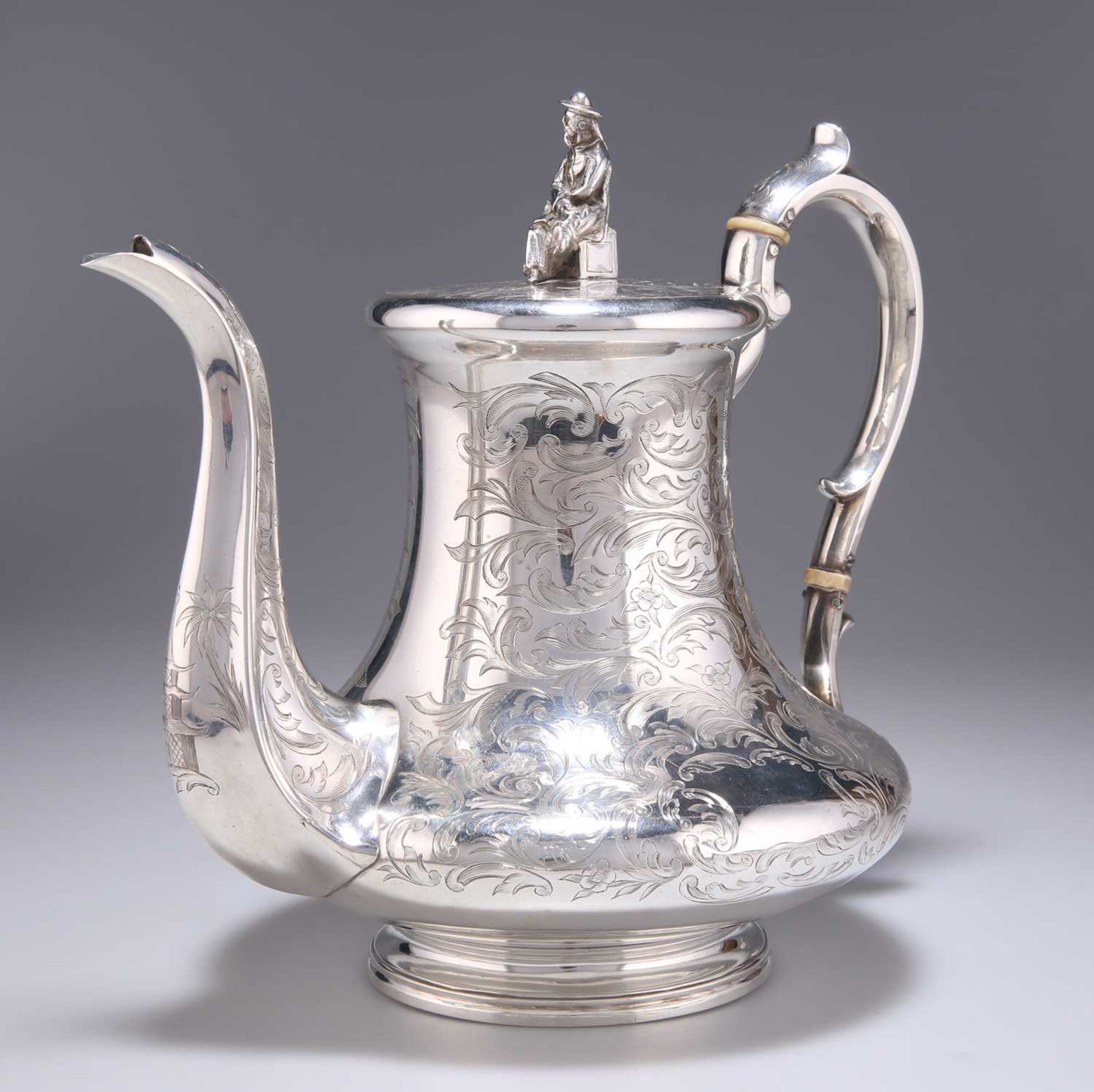 AN EARLY VICTORIAN SILVER COFFEE POT