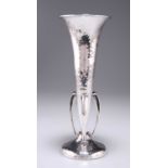 AN ARTS AND CRAFTS SILVER VASE