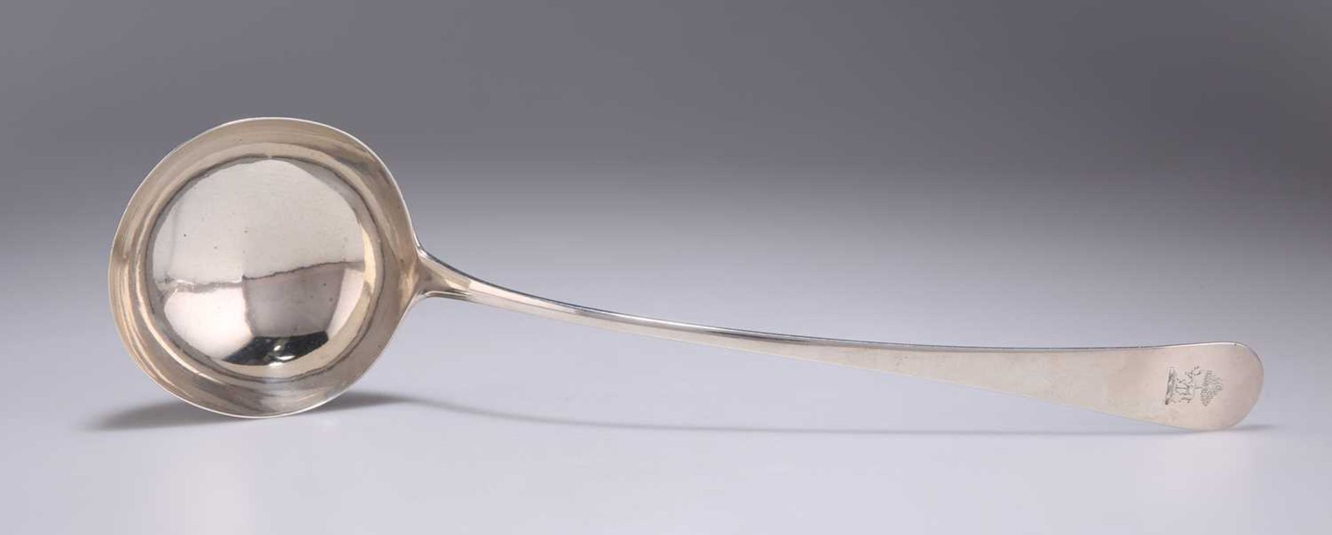 A GEORGE III SILVER SOUP LADLE