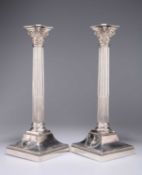 A HANDSOME PAIR OF VICTORIAN NEOCLASSICAL REVIVAL SILVER CANDLESTICKS