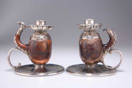 A STRIKING PAIR OF VICTORIAN SILVER-MOUNTED CHAMBERSTICKS