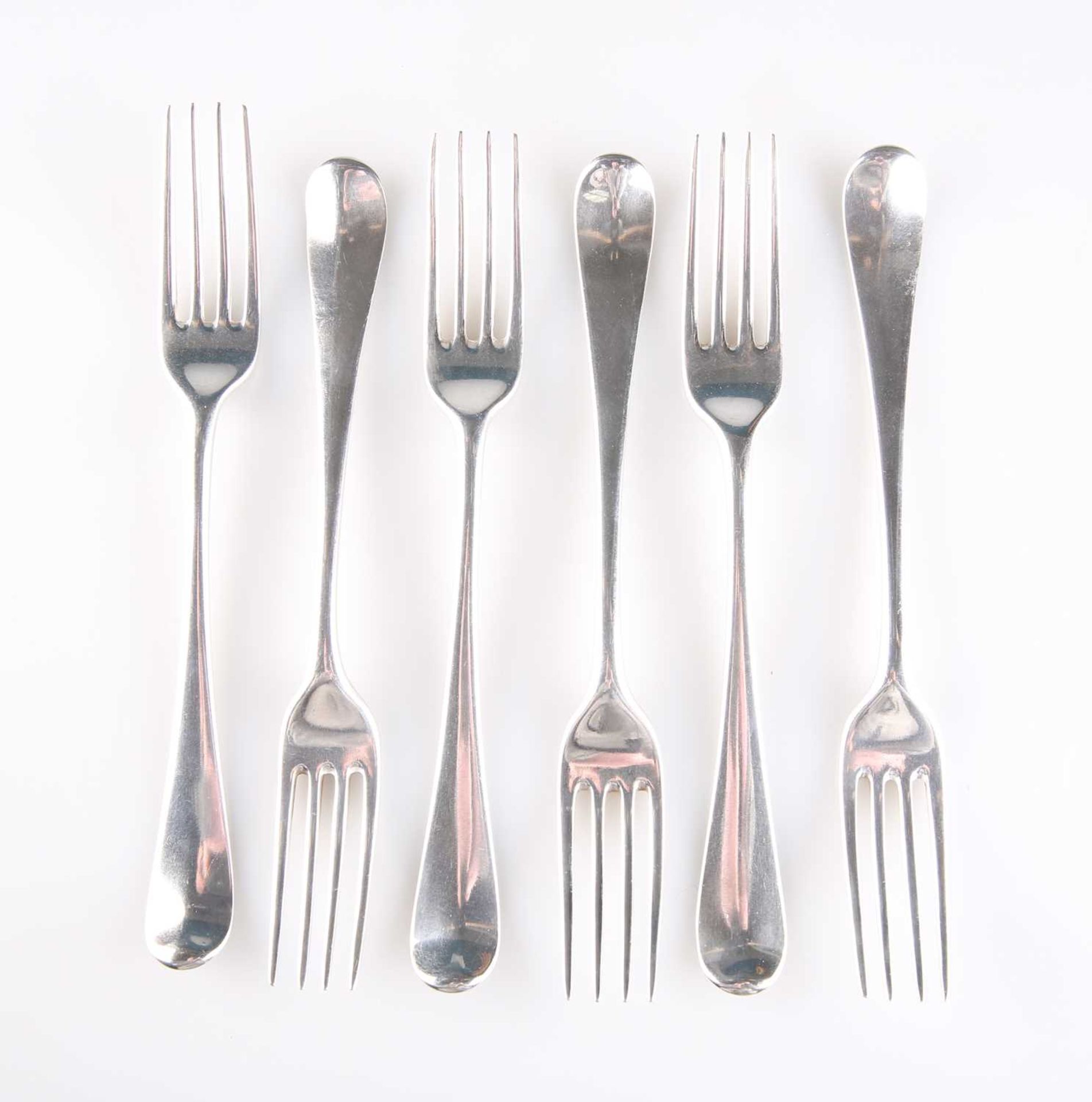 SIX GEORGE III OLD ENGLISH PATTERN SILVER TABLE FORKS