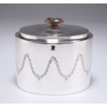 A GEORGE III SILVER TEA CADDY