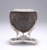 A GEORGE IV SILVER-MOUNTED CARVED COCONUT CUP