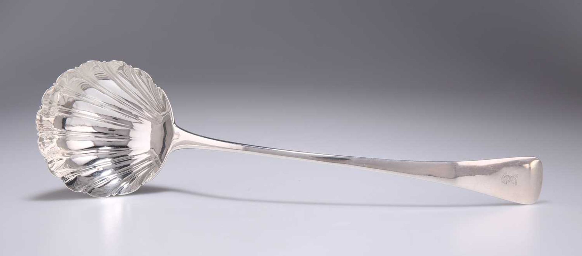 A GEORGE III SILVER SOUP LADLE