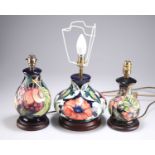 THREE MODERN MOORCROFT POTTERY TABLE LAMPS