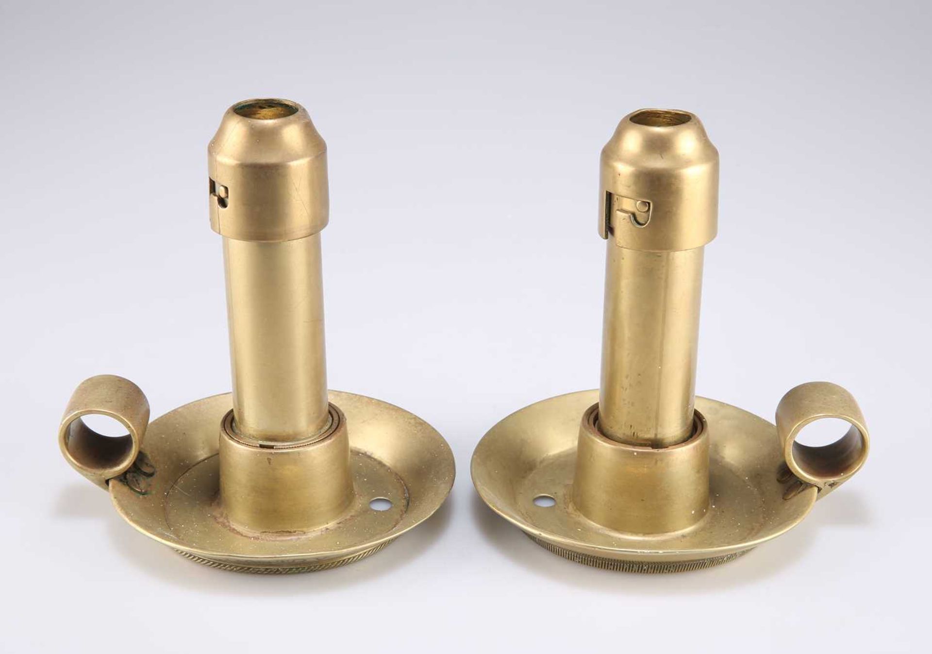 A PAIR OF 19TH CENTURY BRASS SHIP'S CANDLESTICKS