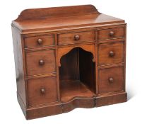 A 19TH CENTURY MAHOGANY KNEEHOLE DRESSING TABLE