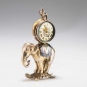 A RARE MINIATURE VIENNESE SILVER-GILT AND ENAMEL ELEPHANT CLOCK, 19TH CENTURY