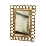A VICTORIAN BRASS LINKED-RING MIRROR