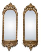 A PAIR OF PERIOD STYLE GILT-COMPOSITION PIER MIRRORS