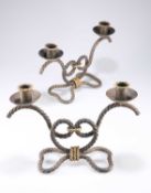 A PAIR OF IRON 'ROPEWORK' TWO-LIGHT CANDELABRA