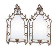 A PAIR OF NEOCLASSICAL STYLE GILT-COMPOSITION MIRRORS