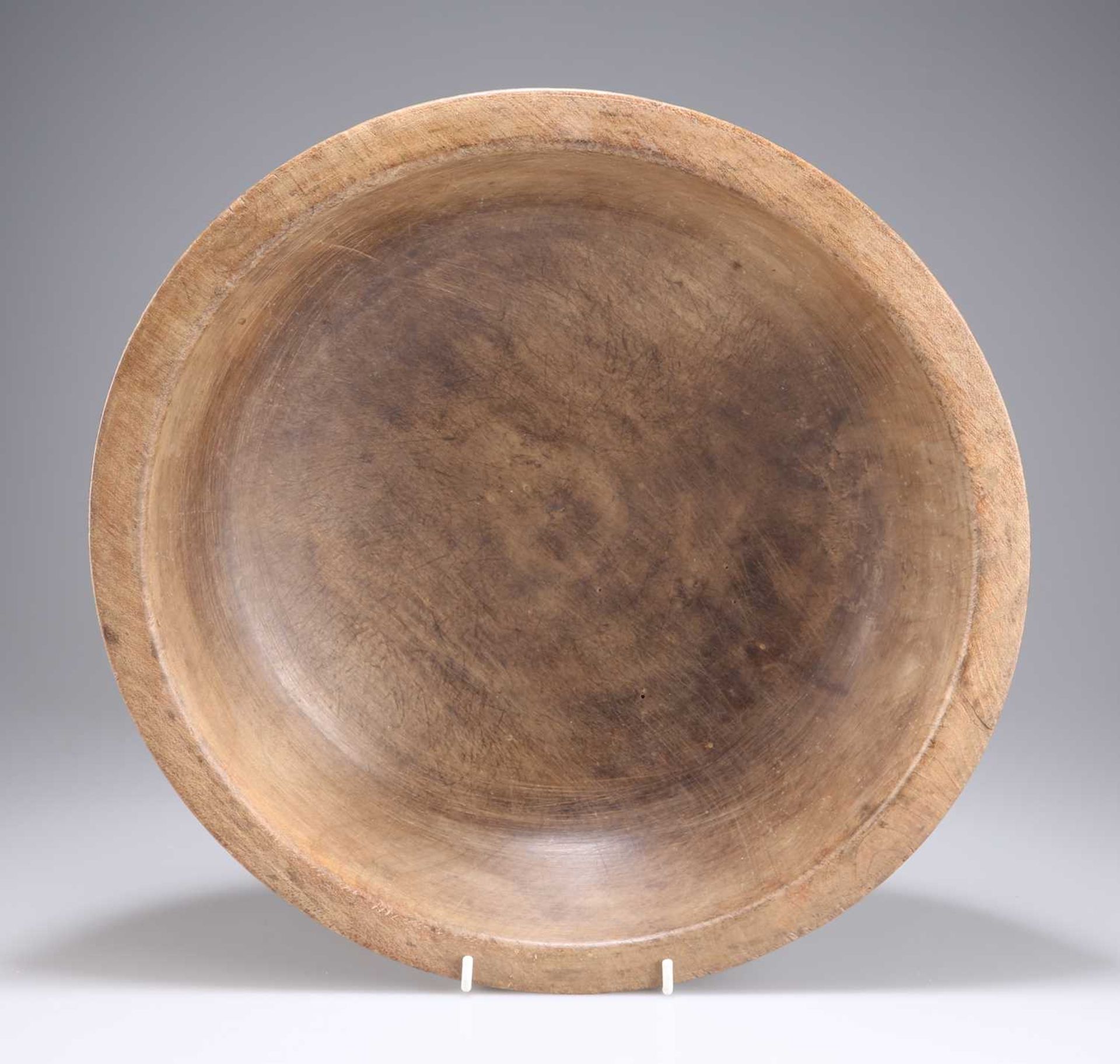 A 19TH CENTURY SYCAMORE DAIRY BOWL