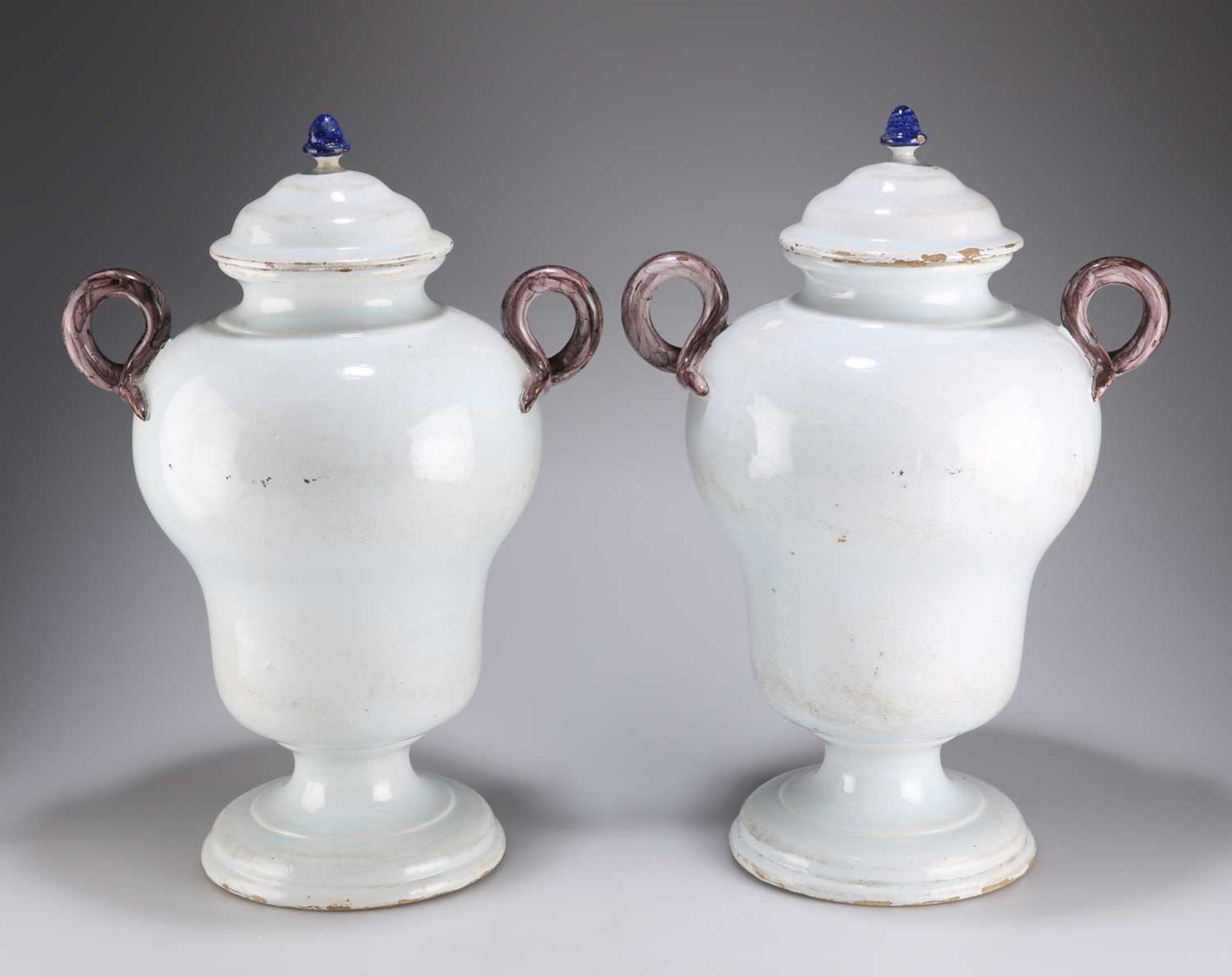 A PAIR OF 19TH CENTURY POLYCHROME DUTCH DELFT PHARMACY JARS AND COVERS - Image 2 of 2