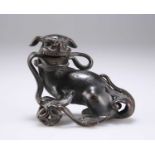 A CHINESE SMALL BRONZE BUDDHIST LION, MING DYNASTY