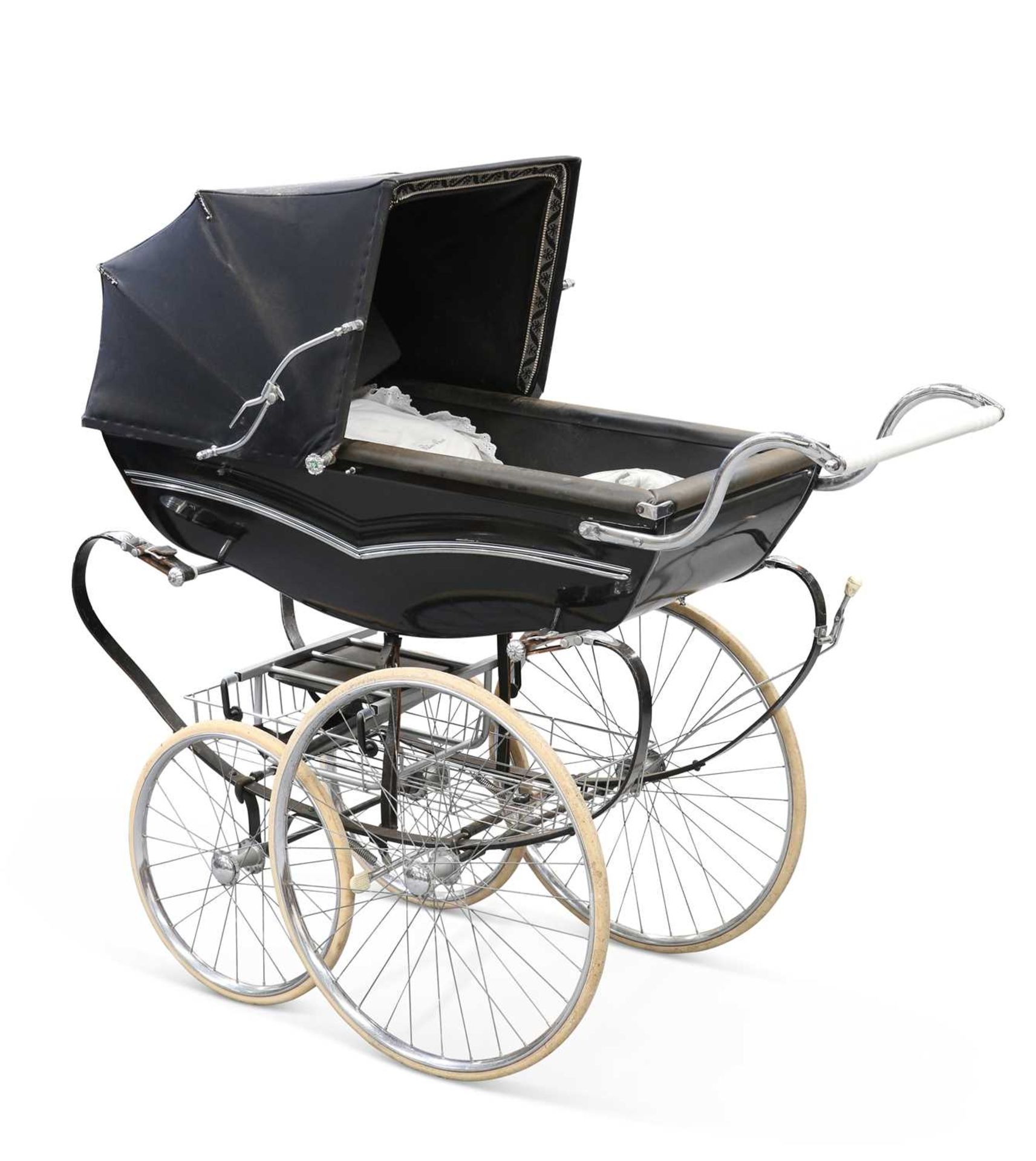 A 1970S SILVER CROSS PRAM