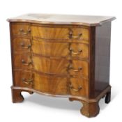 A GEORGE III STYLE MAHOGANY SERPENTINE CHEST