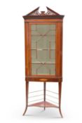 A SHERATON REVIVAL INLAID MAHOGANY CORNER CABINET ON STAND, 19TH CENTURY