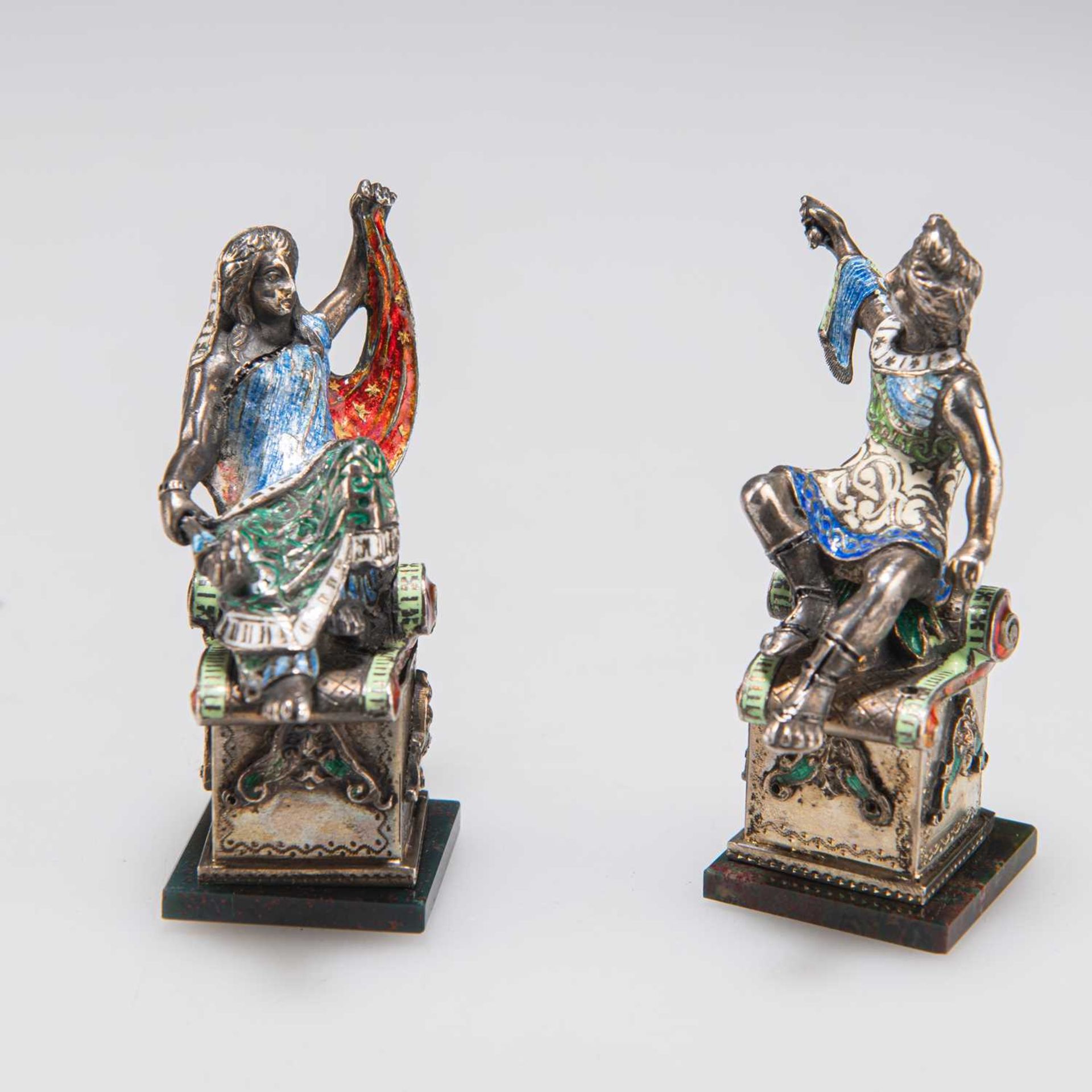 A PAIR OF CONTINENTAL SILVER AND ENAMEL FIGURES, 19TH CENTURY