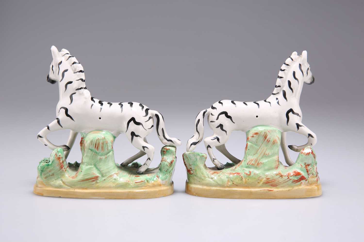 A PAIR OF 19TH CENTURY STAFFORDSHIRE POTTERY ZEBRAS - Image 2 of 2