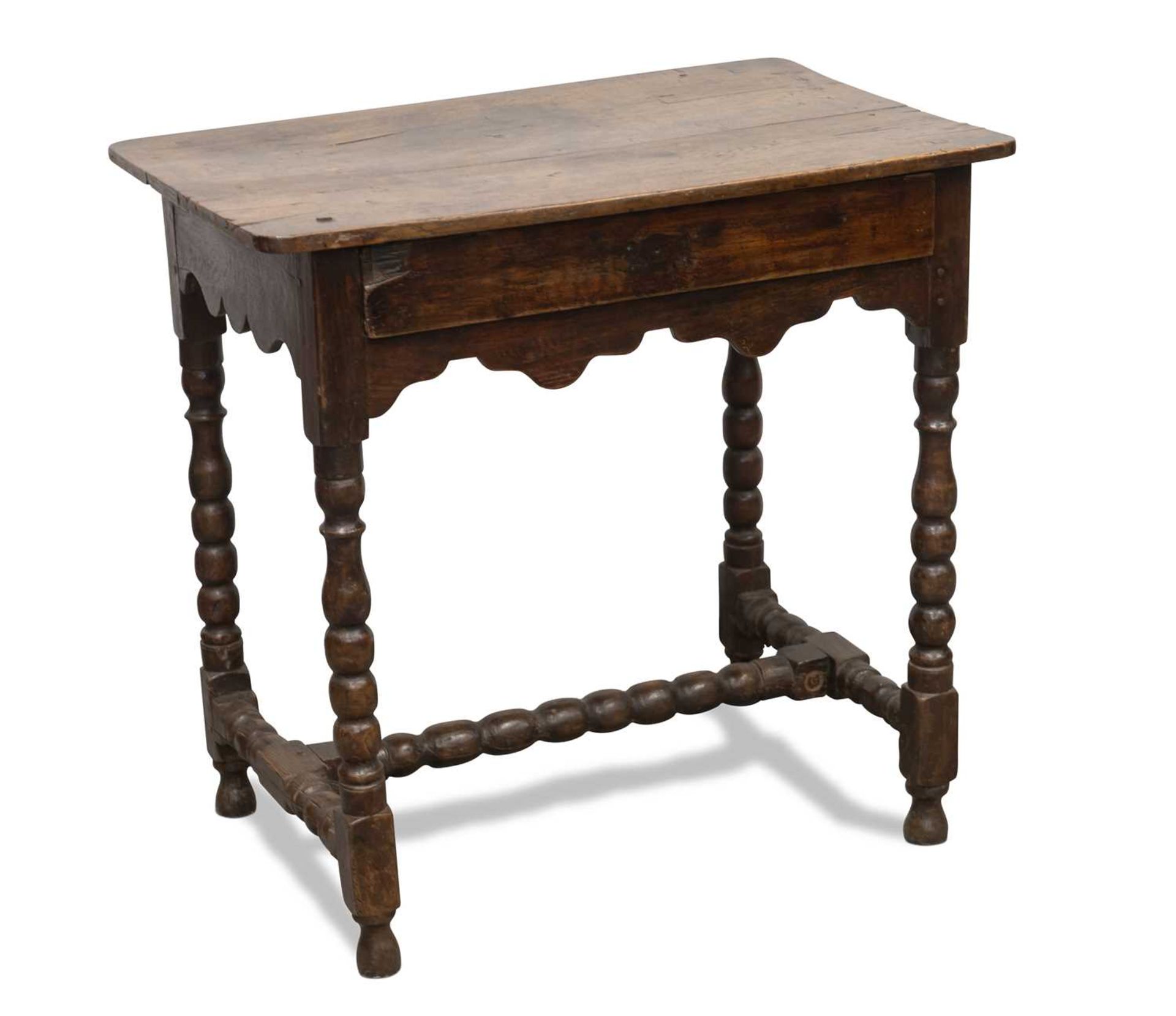 A PRIMITIVE 18TH CENTURY OAK AND PINE SIDE TABLE
