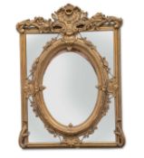 A LARGE PERIOD STYLE GILT-COMPOSITION SECTION MIRROR