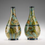 HELEN A. ARDING FOR DOULTON LAMBETH, A PAIR OF LATE 19TH CENTURY FAÏENCE POTTERY BOTTLE VASES