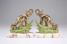 A PAIR OF ART DECO BRASS AND PAINTED 'ELEPHANT' BOOKENDS