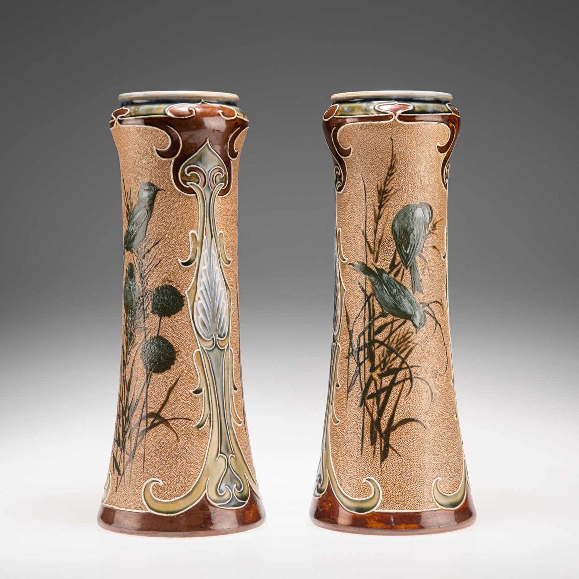 FLORENCE E. BARLOW FOR DOULTON LAMBETH, A PAIR OF LATE 19TH CENTURY PÂTE-SUR-PÂTE STONEWARE VASES