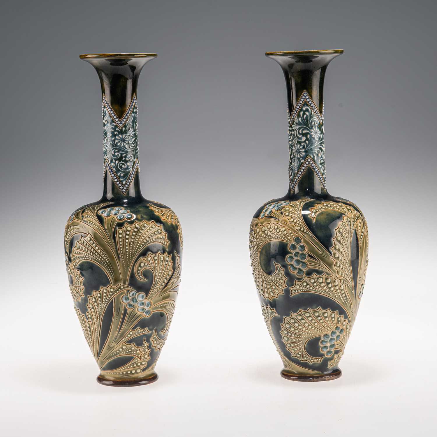 ELIZA SIMMANCE FOR DOULTON LAMBETH, A PAIR OF LATE 19TH CENTURY STONEWARE BOTTLE VASES