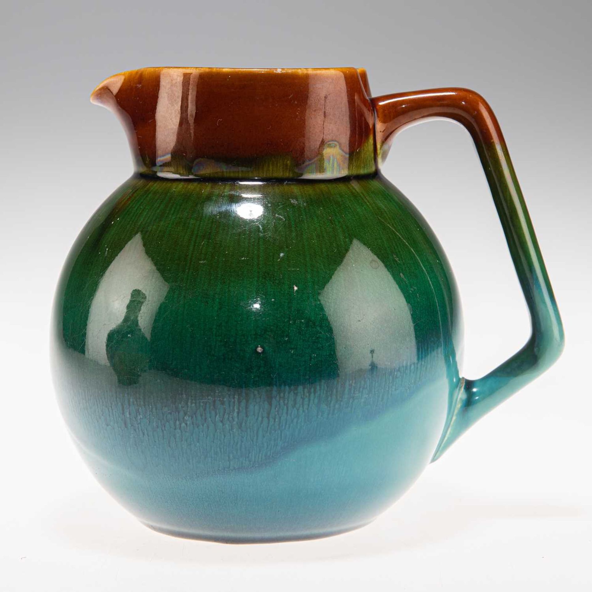 CHRISTOPHER DRESSER (1834-1904) FOR LINTHORPE POTTERY, AN ART POTTERY JUG