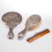 AN EDWARDIAN ART NOUVEAU SILVER-BACKED DRESSING TABLE SET