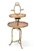 A LOUIS XV STYLE ORMOLU AND KINGWOOD TWO-TIER TABLE, IN THE MANNER OF FRANCOIS LINKE