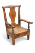 AN EARLY 19TH CENTURY OAK COUNTRY CHILD'S COMMODE CHAIR