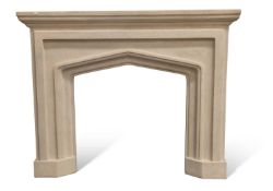 A PERIOD STYLE FAUX STONE FIRE SURROUND