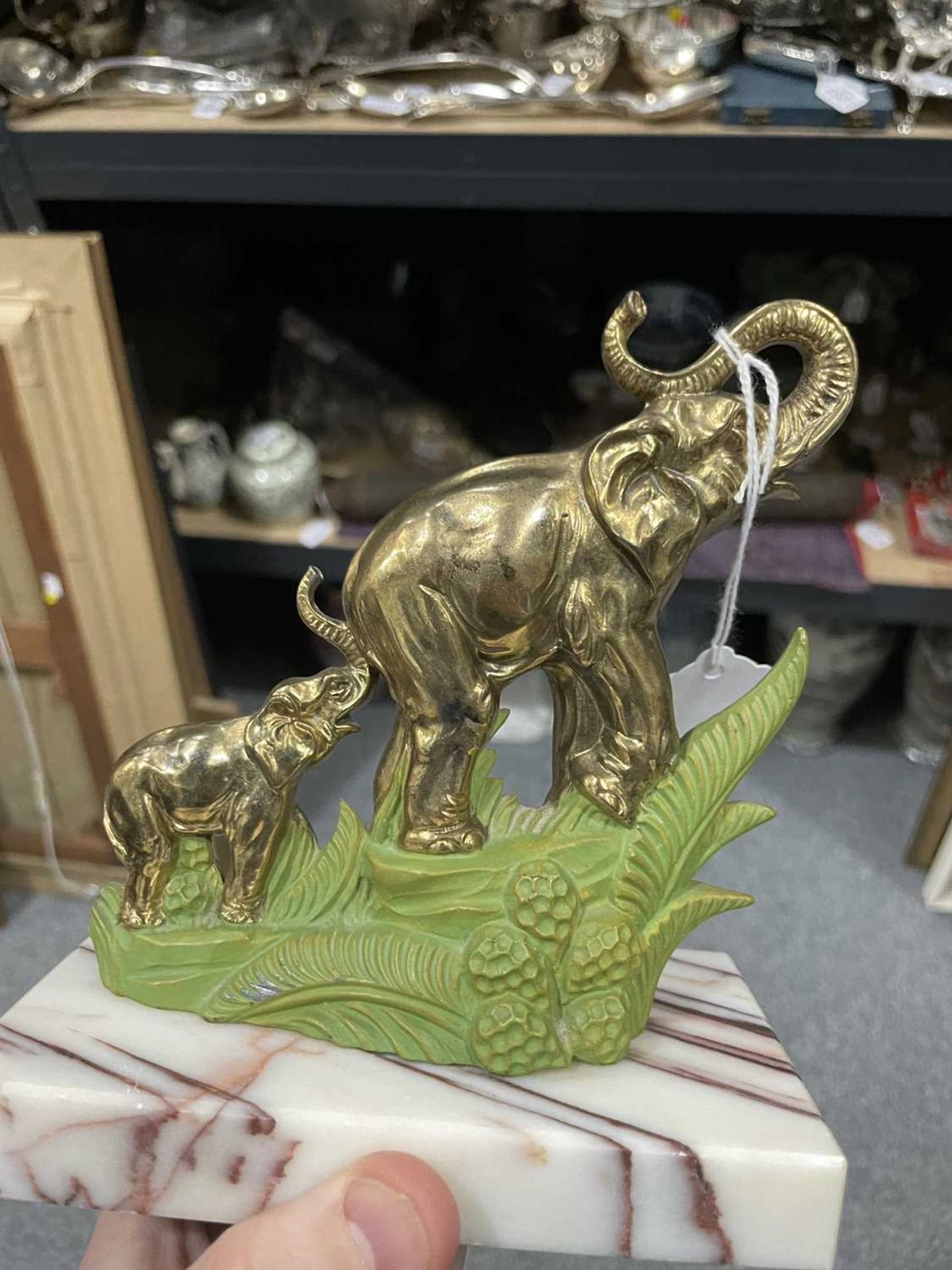 A PAIR OF ART DECO BRASS AND PAINTED 'ELEPHANT' BOOKENDS - Image 9 of 9