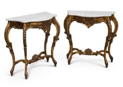 A PAIR OF LOUIS XV STYLE MARBLE-TOPPED GILTWOOD CONSOLE TABLES