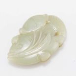 A CHINESE JADE 'CARP' PENDANT