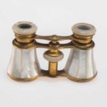 A PAIR OF EARLY 20TH CENTURY BRASS AND MOTHER-OF-PEARL OPERA GLASSES