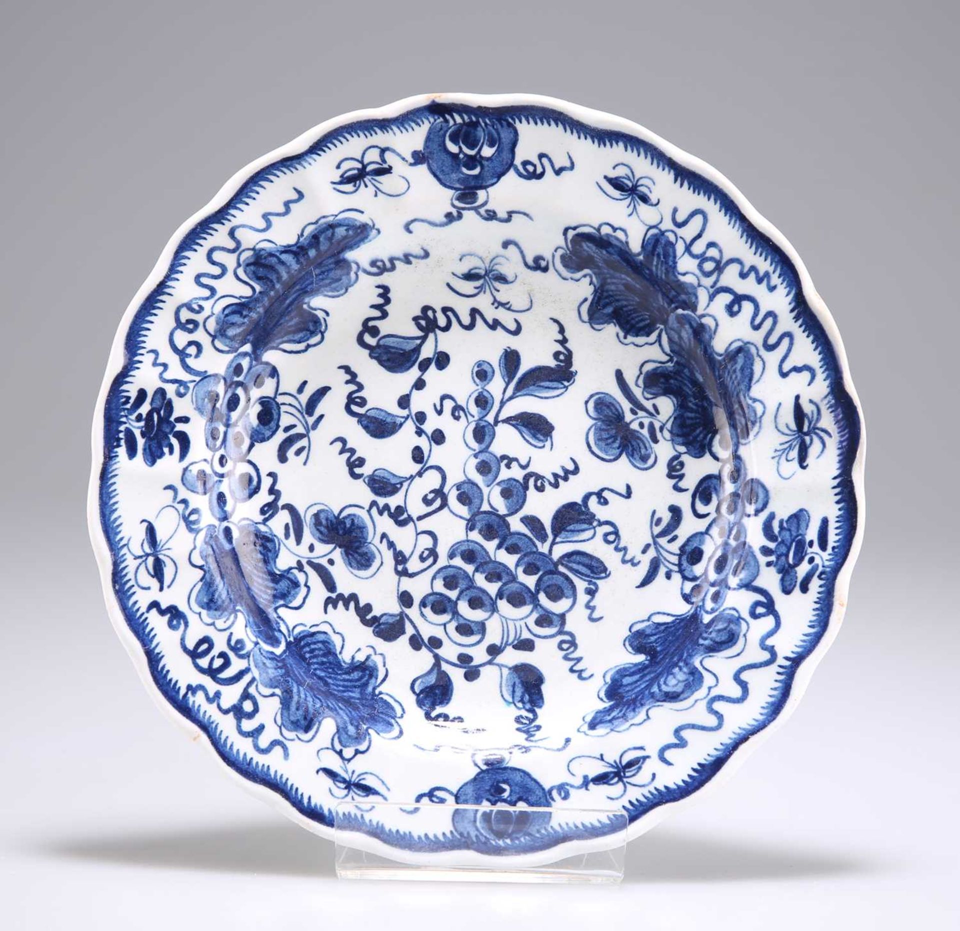 A BOW BLUE AND WHITE DESSERT PLATE, CIRCA 1760