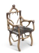 A SIMULATED ANTLER CHAIR