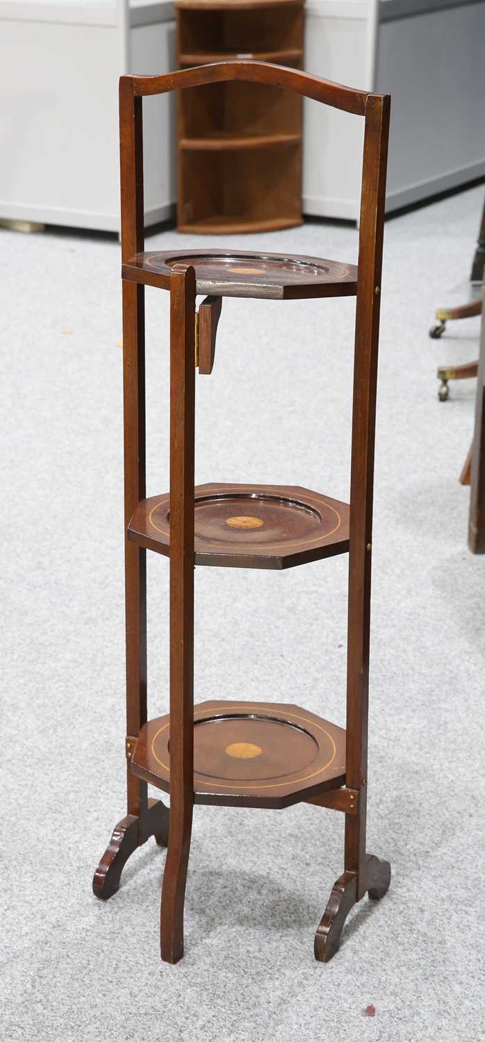 AN EDWARDIAN INLAID MAHOGANY FOLDING CAKESTAND - Image 2 of 3