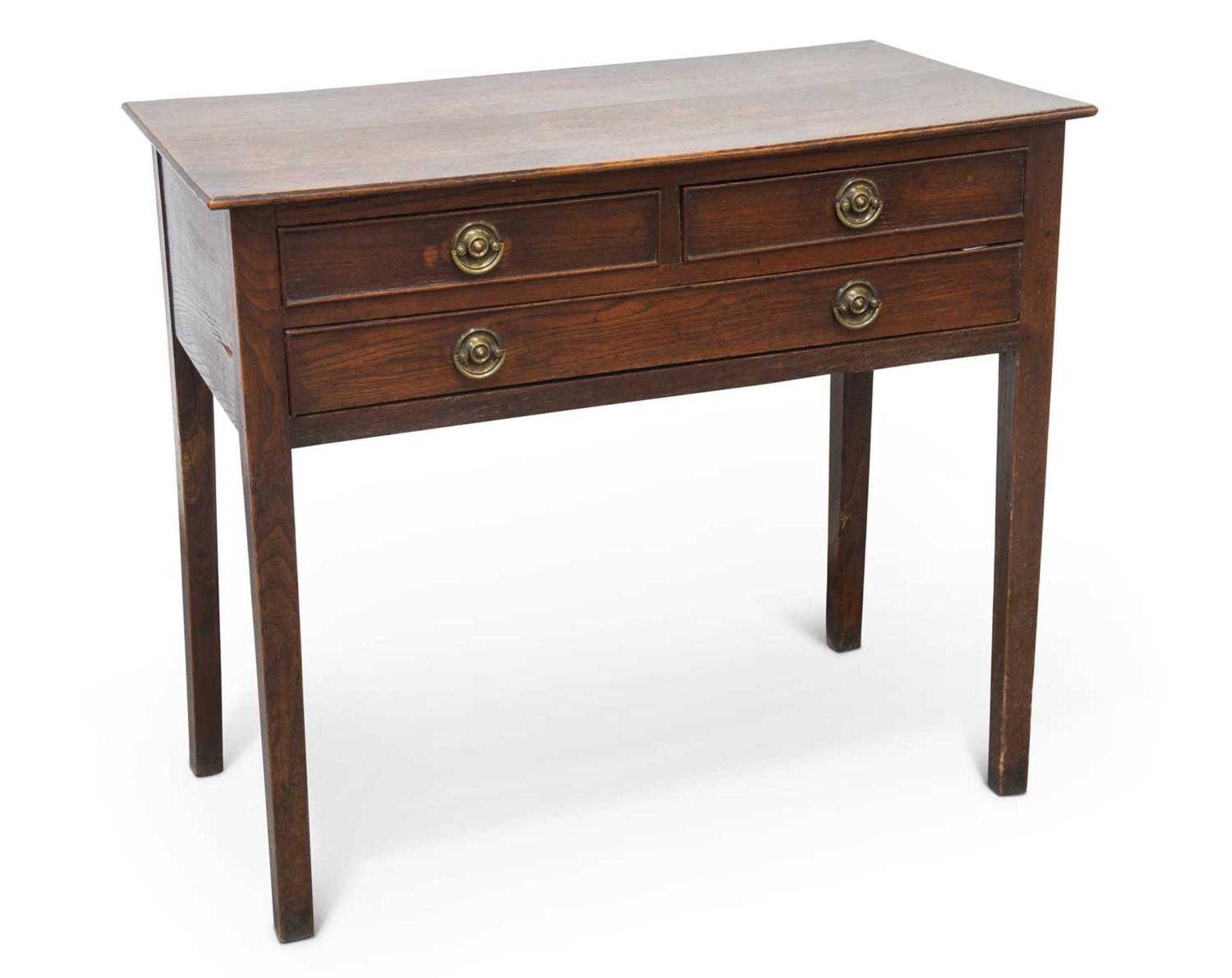 A GEORGE III OAK LOWBOY