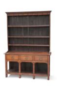 AN 18TH CENTURY OAK DRESSER AND RACK