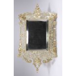 A VICTORIAN BRASS WALL MIRROR, BY WILLIAM TONKS & SONS, BIRMINGHAM
