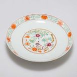 A CHINESE FAMILLE ROSE SAUCER DISH