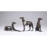 THREE BRONZE MODELS OF GREYHOUNDS